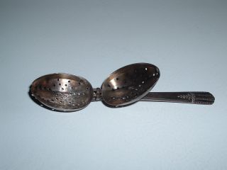 Tea Ball Spoon Wm.  A.  Rogers,  A1 Plus Oneida Ltd. ,  5 1/2 