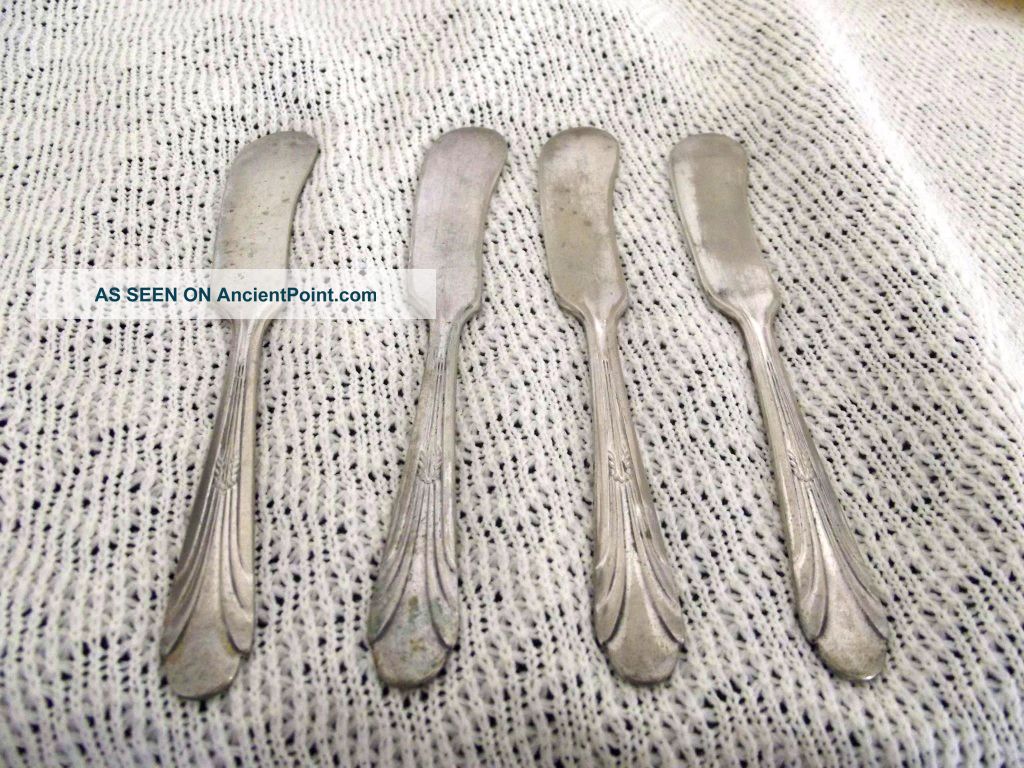 4 Vintage Butter Knives Oneida/Wm. A. Rogers photo