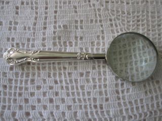 Magnifying Glass In Daybreak Or Elegant Lady By International /rogers photo