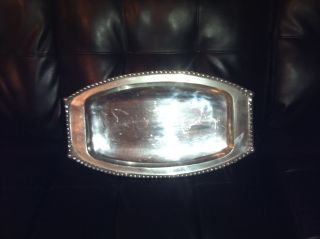 Silver Platter And Wall Scounce photo