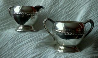 Vintage Silver Plated Milk And Crreamer Set photo