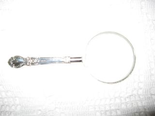 Magnifying Glass In Brocade By International photo