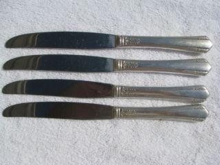 Wm.  A.  Rogers 4 Stainless Dinner Knives. photo