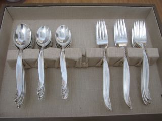 52 Piece Set Of Leilani - 1847 Roger Bros.  Silverplate Flateware - Service For 8 photo