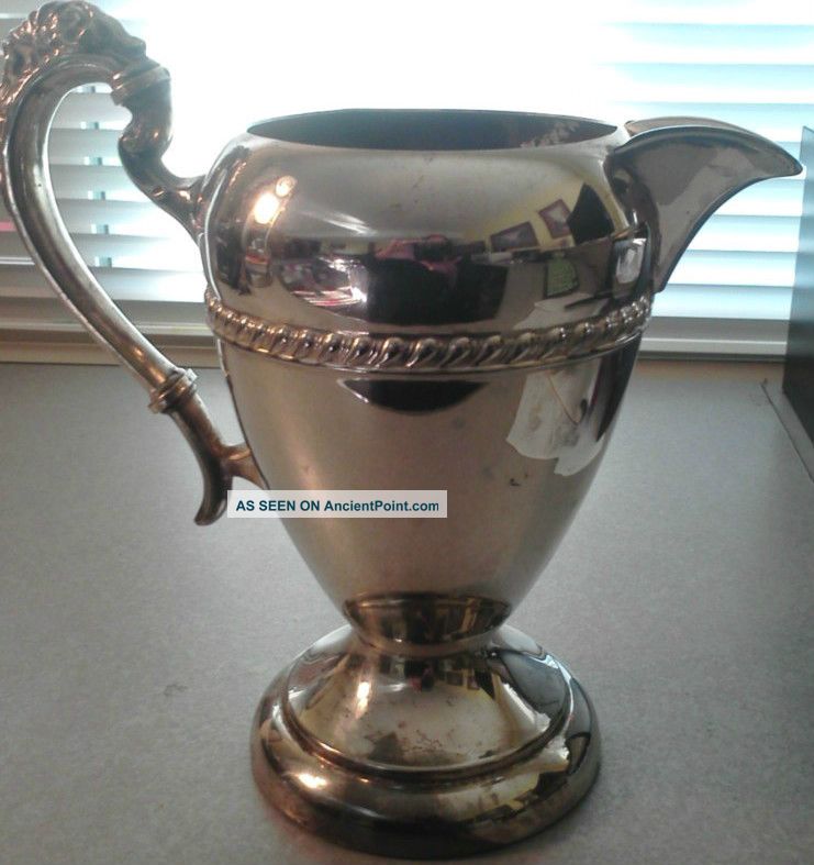 Silver On Copper Pitcher - Marked Unknown photo