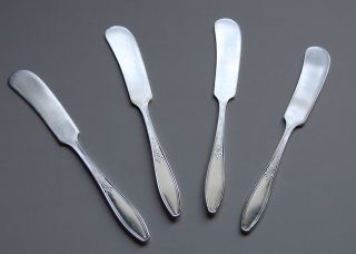 4 Vintage Wm.  A.  Rogers Silverplate Butter Spreaders photo