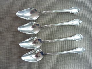 Four 1847 Rogers Bros.  Remembrance Silverplate Orange Fruit Spoon photo