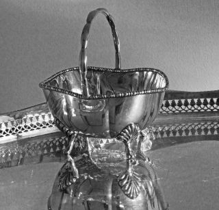 A Small Ornamental Mid Victorian Silver Plated Handled Basket.  Four Pretty Feet. photo