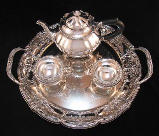 Silver Plate Tea Pot Set – Tea Pot,  Creamer,  Sugar And A Round Tray With Handles photo