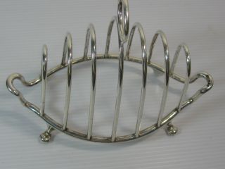 A Vintage English Solid Silver Six Slice Toast Rack photo
