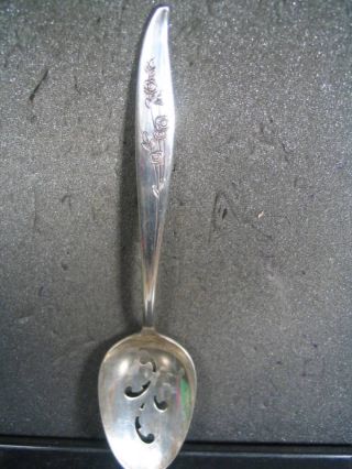 Sterling Oneida Heirloom Young Love Prcd Serving Spoon photo