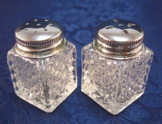 Small Salt And Pepper Shakers In Pressed Glass With Two Lids In Silver Plate photo