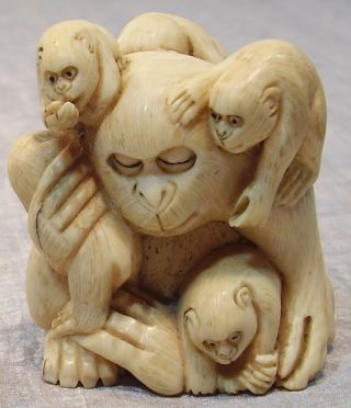 From Estate Detailed Signed Netsuke Man With Monkeys 2 Inch photo
