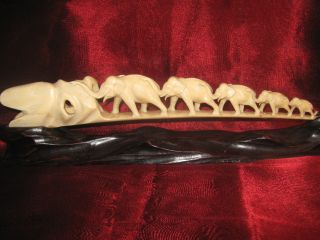 Chinese Carved Bovine Bone Elephant Walk On Wooden Bridge photo