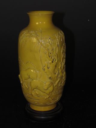Chinese Yellow Porcelain Carve Horse Vase photo