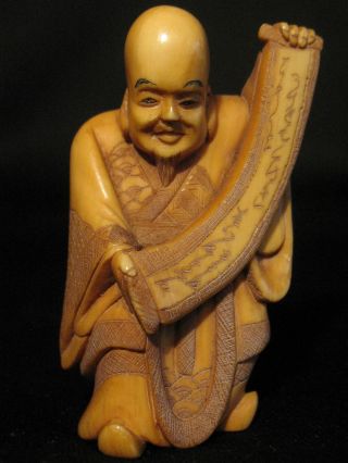 Antique Japanese 象牙 Stained Ox Bone Okimono Figure Of Immortal W.  Scroll Signed photo