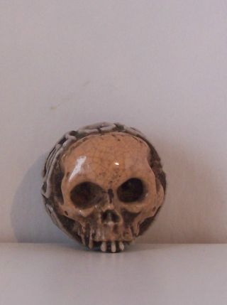 Antique Japanese Porcelain Ojime Bead Of A Skull photo