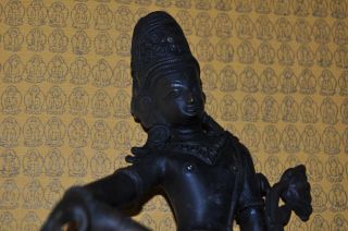 Black Bronze Statue Of Shiva photo