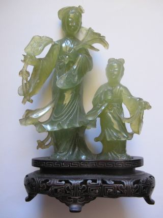 Chinese Green Jade Woman And Girl In Old Fashion With Wood Stand photo