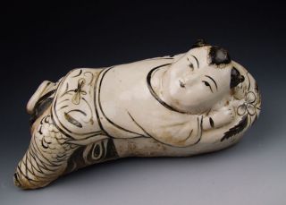 One Cizhou Ware Porcelain Boy - Shaped Headrest photo