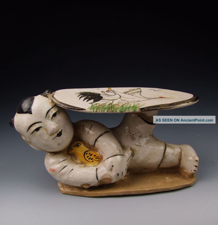 One Cizhou Ware Porcelain Boy - Shaped Headrest Vases photo