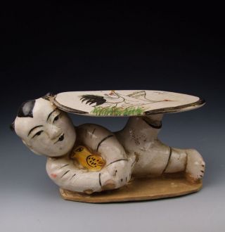 One Cizhou Ware Porcelain Boy - Shaped Headrest photo