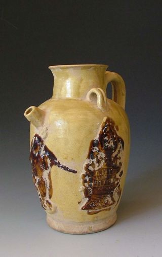 Tang Dynasty Changsha Kiln Yellow Glaze Pottery Vine Pot photo