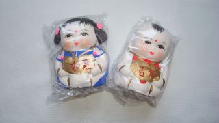 Hand Crafted And Painted Chinese Traditional Clay Dolls photo