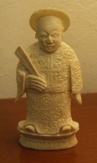 Finely Carved 19th Century Chinese Bone Figure Of An Emperor Holding A Fan photo