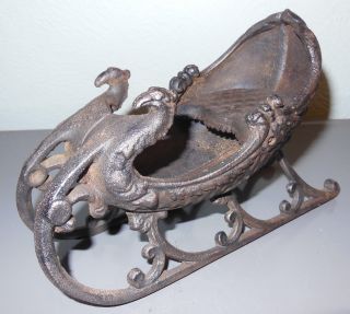 Hubley Toy Co.  Victorian Cast Iron Sleigh With Griffon Heads (1910) photo
