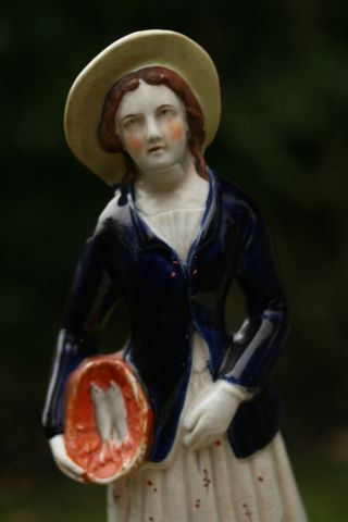Mid 19th C.  Staffordshire Of Female Figurine With Basket Of Fish C1850 photo