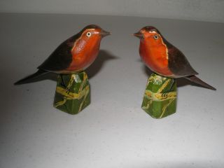 A Very Early Pair Of Pa Carved And Polychromed Birds photo