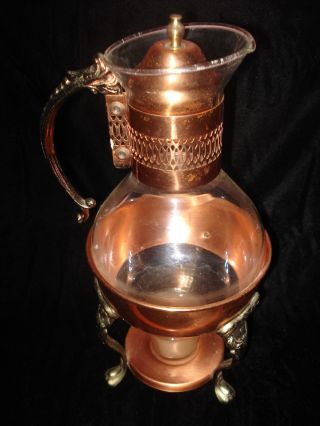 Copper And Glass Tea Pitcher photo