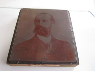 Antique Copper Plate Photograph Of Man On Wooden Block photo