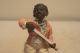 Early Porcelain Huebach Figure African American Boy Playing Banjo 4.  25 