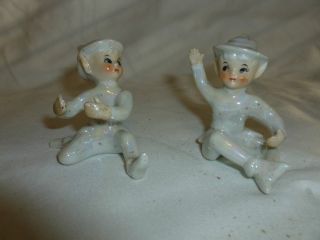 White Porcelain Candle Cupids photo