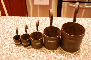 Antique German Measuring Cups photo