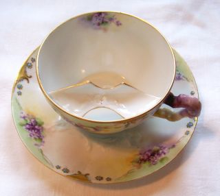 Mustache Cup & Saucer Marked Depose France photo