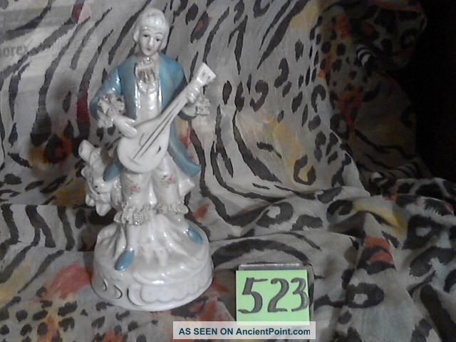 Item 523 Eight Inch Tall Porcelain Minstral Figurine Figurines photo