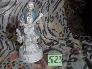 Item 523 Eight Inch Tall Porcelain Minstral Figurine photo
