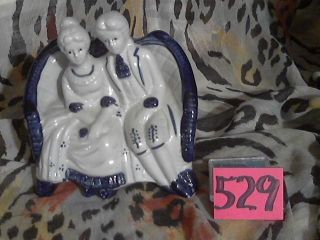 Item 529 Six Inch Tall Colonial Lovers On A Couch Porcelain Figurine photo
