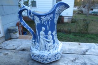 Antique Porcelain Pitcher,  Raised Design Couples In Courtyard photo