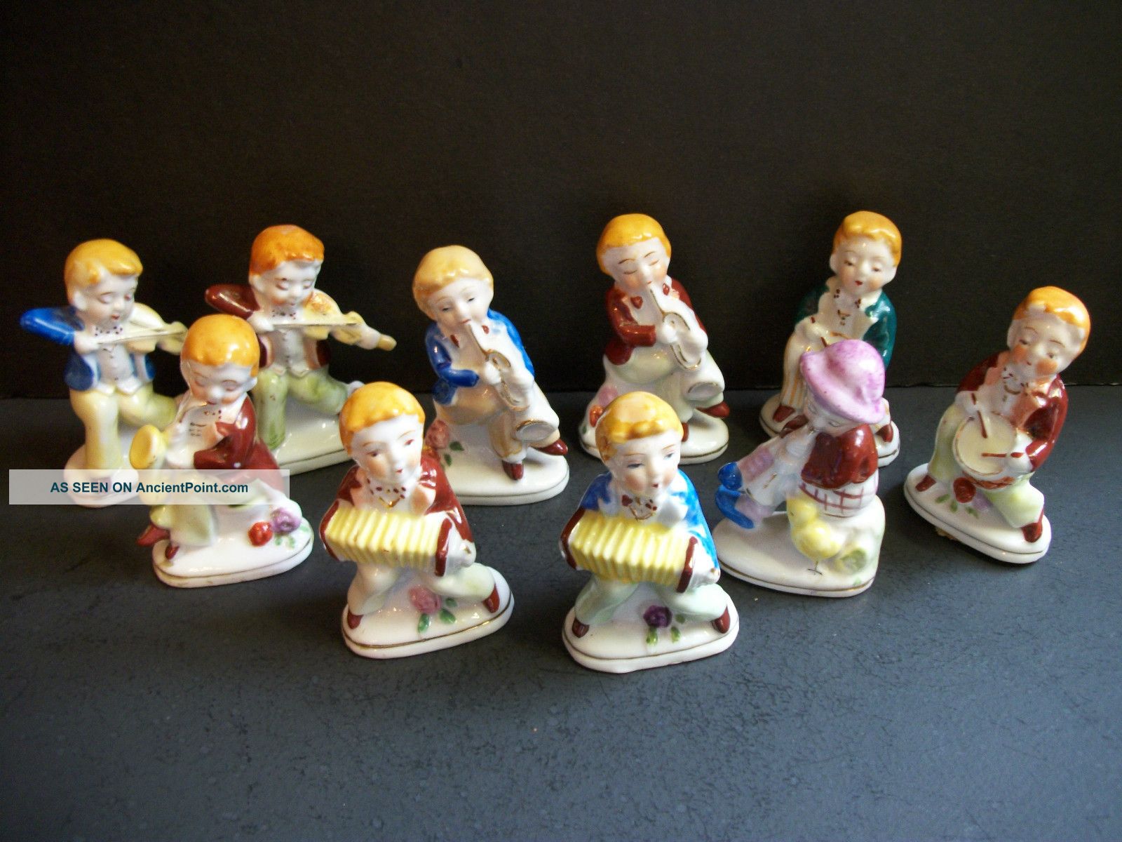 Group Of 10 Occupied Japan Figurines/musicians/violins/drums/horns/accordians/ex Figurines photo