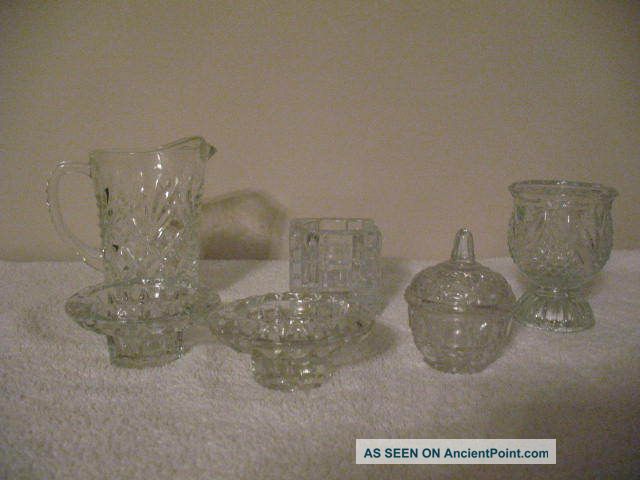 6 Pc.  Clear Glassware,  1 - Trinket Holder,  1 - Sm.  Pitcher,  4 - Candle Holders, Other photo