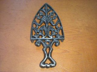 Painted Cast Iron Wilton Trivet With Feet,  Not Common,  A Find photo