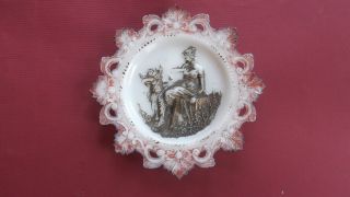 Antique Milk Glass Plate,  Open Scrolls,  Woman & Cupid In Relief photo