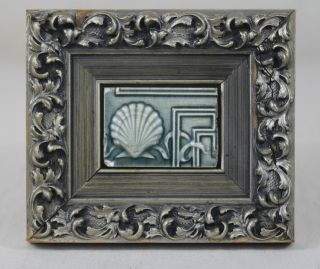 Antique Tile In An Ornate Frame photo