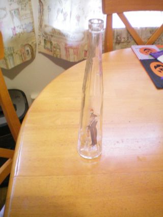 Vintage Long Neck Glass Bottle Made In Italy With An Italian General Logo On It photo