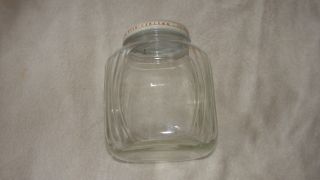 Collectible Decorative Glass Canister Jar Design Storage Jar photo