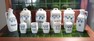 Cream/blue Arts & Crafts Grapevine German Canisters 